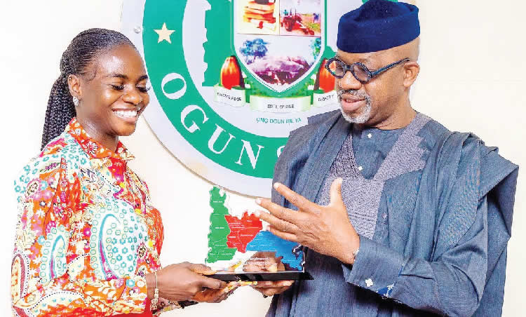 Ogun governor welcomes Amusan home with house, N5m