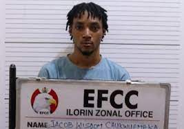 Court jails Nigerian footballer 12 years for internet fraud