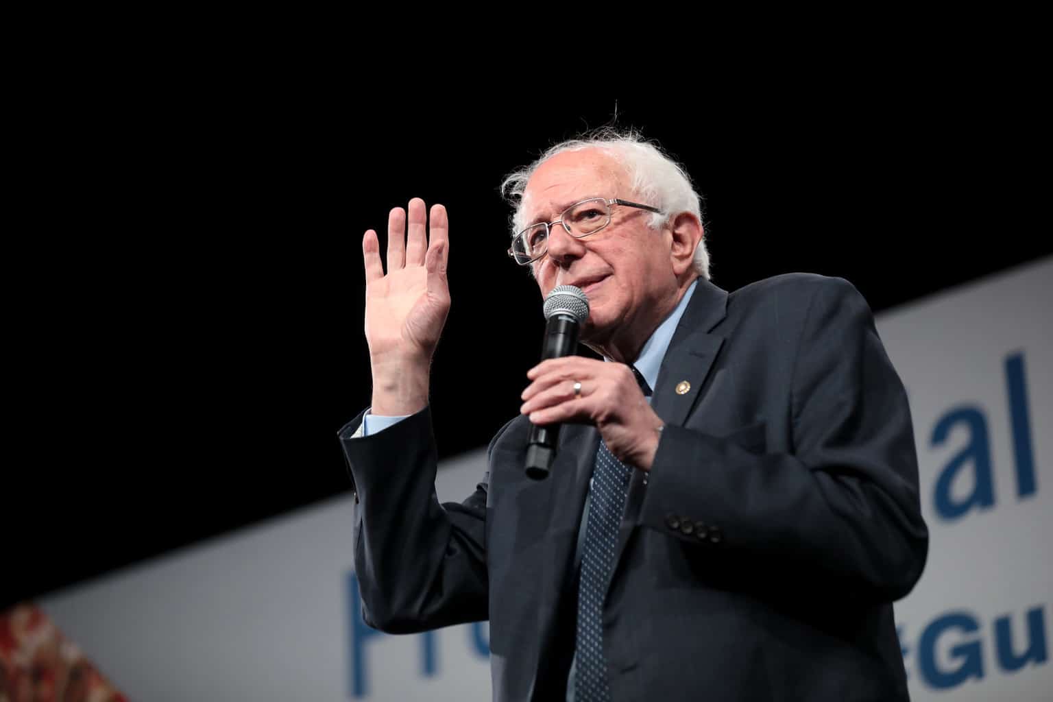 Bernie Sanders waves to crowd